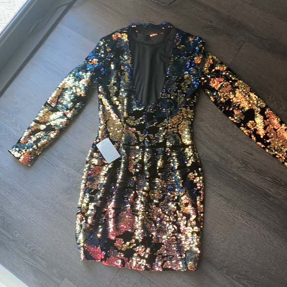 New with tags party dress. This dress is stunning and never been worn. - Picture 4 of 9